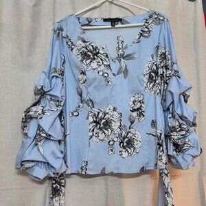 Ladies Top. WHBM,size 10. Beautiful Styling and colors.